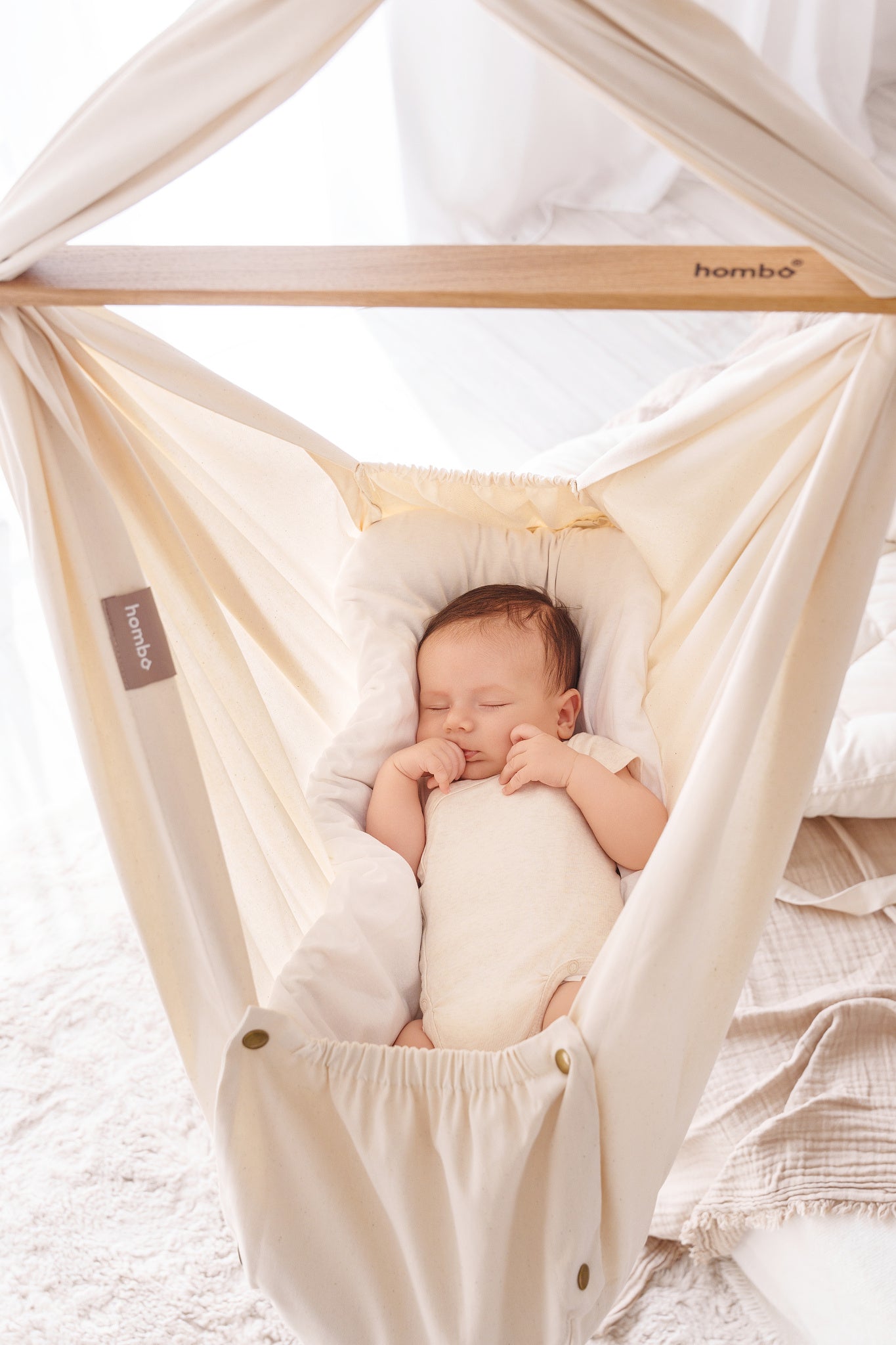 Prečo je  homba baby závesná kolíska vhodná už od narodenia?